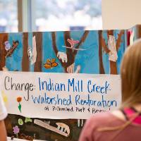 poster reading "indian mill creek watershed restoration"